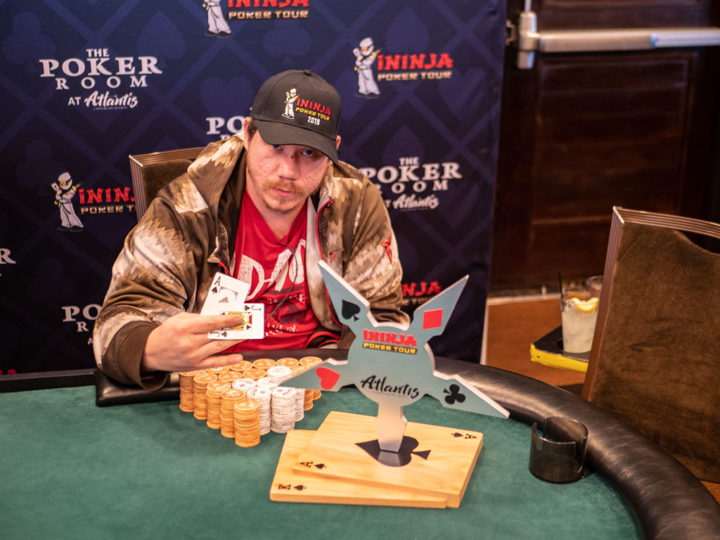 Kyle Wright poses with the trophy at the iNinja poker tour event at Atlantis casino